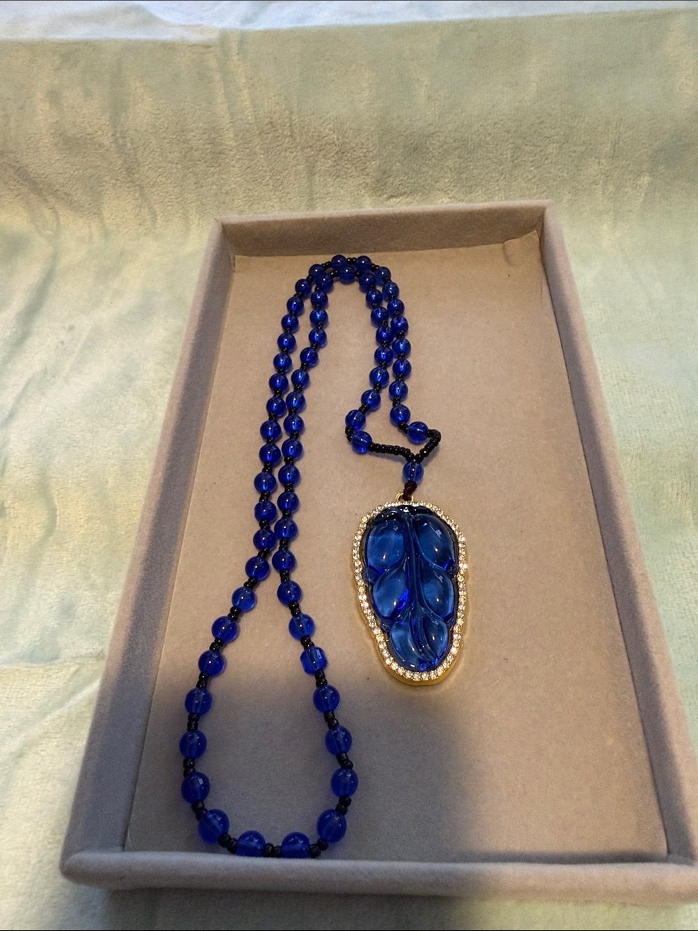 Cobalt Glass Buddha Necklace with Gold-Tone Crystal Pendant